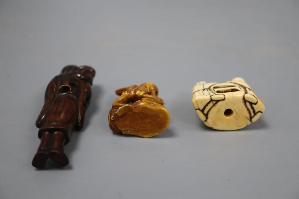 Two Japanese ivory netsuke/okimono carvings and a hardwood figural netsuke, longest 9cm